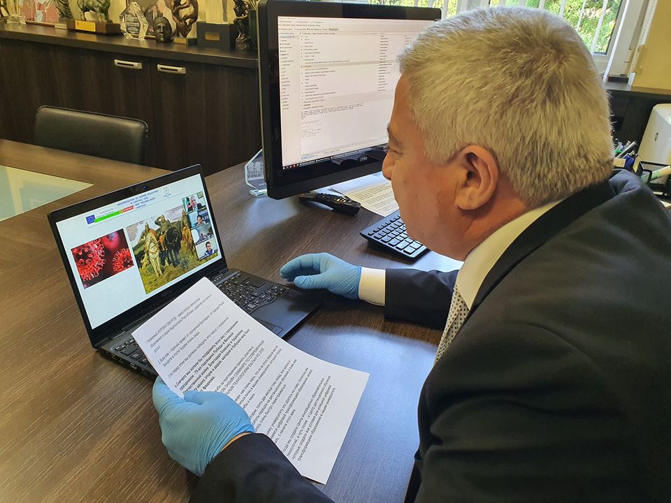 Rector with gloves.jpg